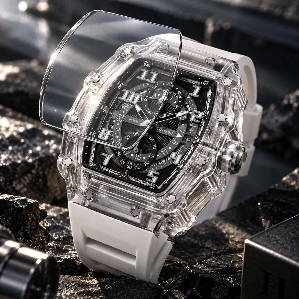 Close-up of Hudson Mercury Noverque 2B45 transparent tonneau watch case and detailed black dial